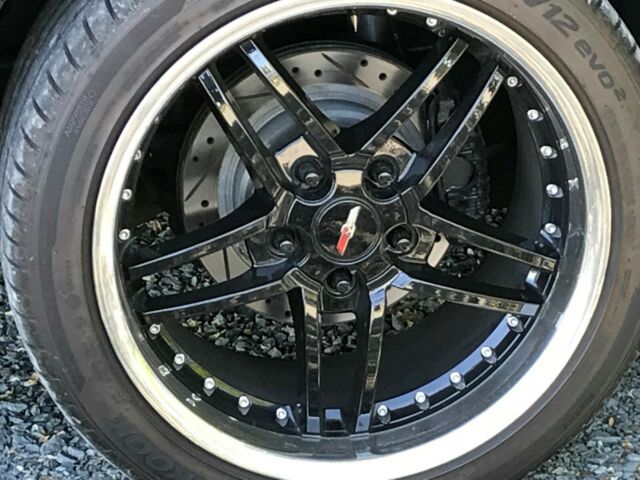 1984 black Chevrolet Corvette Coupe