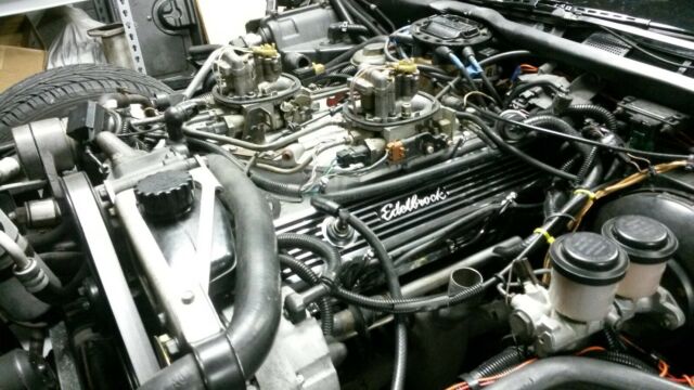 1984 black Chevrolet Corvette Coupe