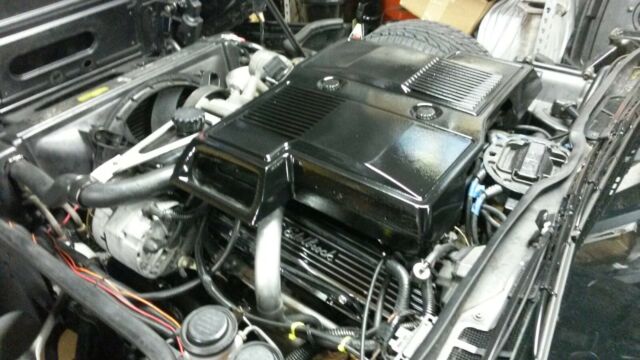 1984 black Chevrolet Corvette Coupe