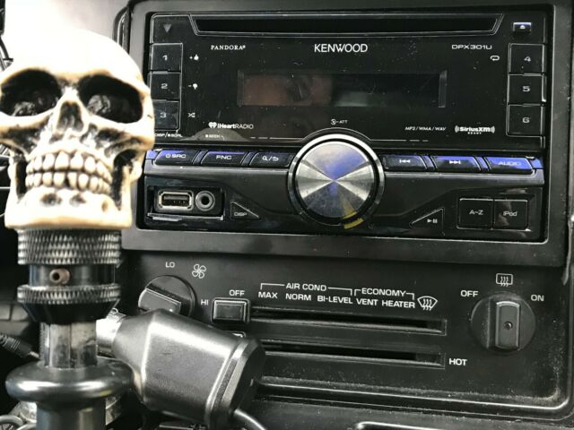 1984 black Chevrolet Corvette Coupe