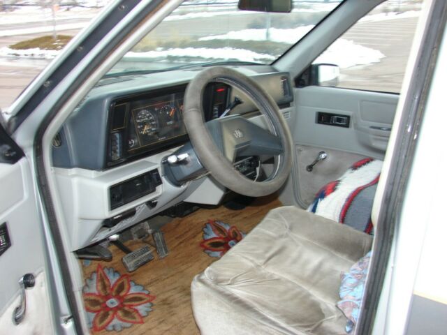 1984 Silver Dodge Ram Mini Minivan