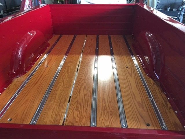 1984 red & silver Ford F-150 Standard Cab Pickup