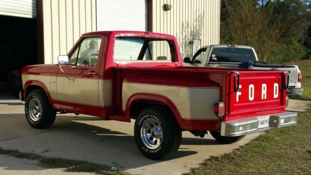 1984 red & silver Ford F-150 Standard Cab Pickup