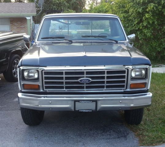 1984 blue and white Ford F-250 Pick-up