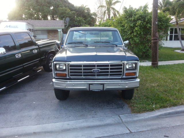 1984 blue and white Ford F-250 Pick-up