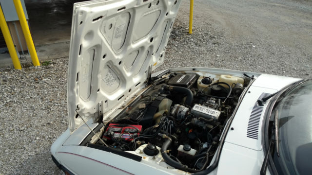 1984 white Mazda RX-7 Coupe