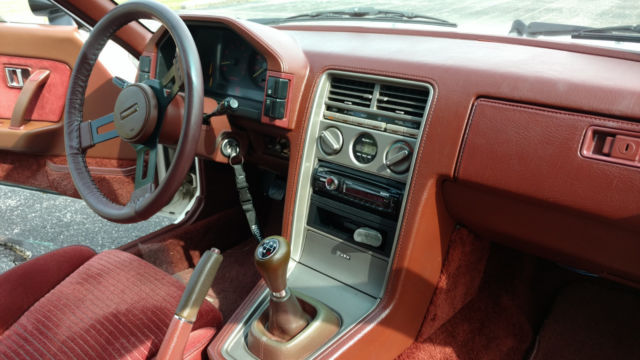 1984 white Mazda RX-7 Coupe