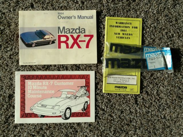 1984 white Mazda RX-7 Coupe