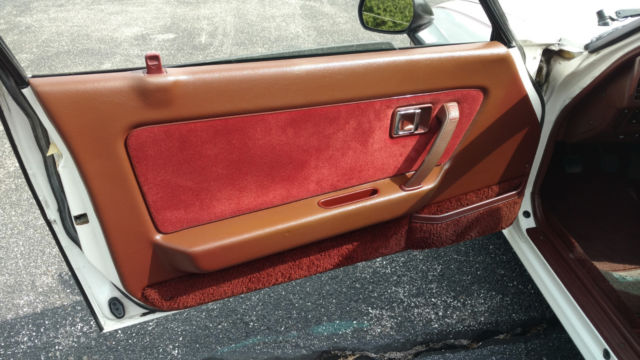 1984 white Mazda RX-7 Coupe