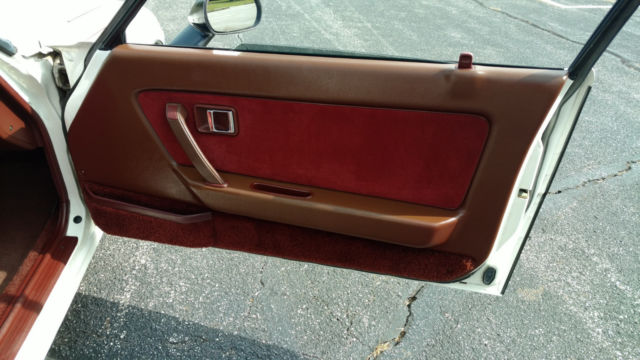 1984 white Mazda RX-7 Coupe