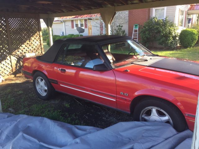 1984 red Ford Mustang Convertible