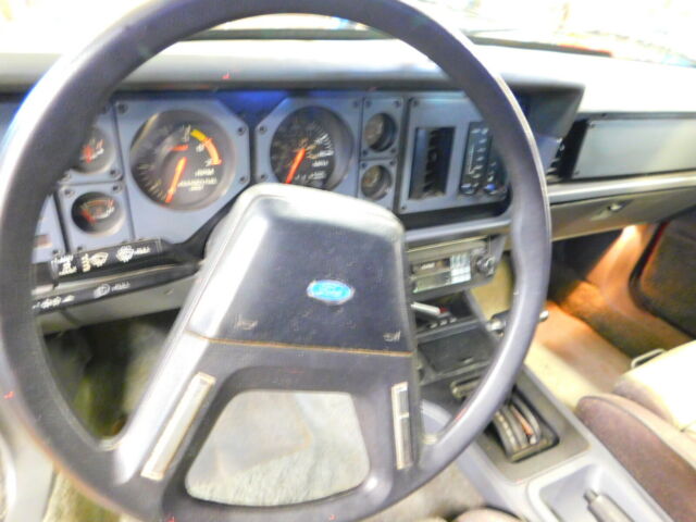 1984 Red Ford Mustang Convertible