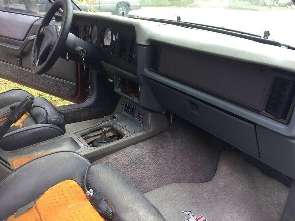 1984 Burgundy Ford Mustang Hatchback