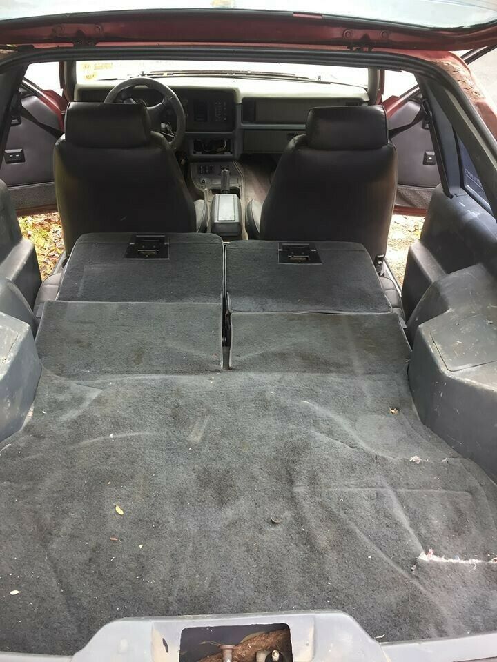 1984 Burgundy Ford Mustang Hatchback