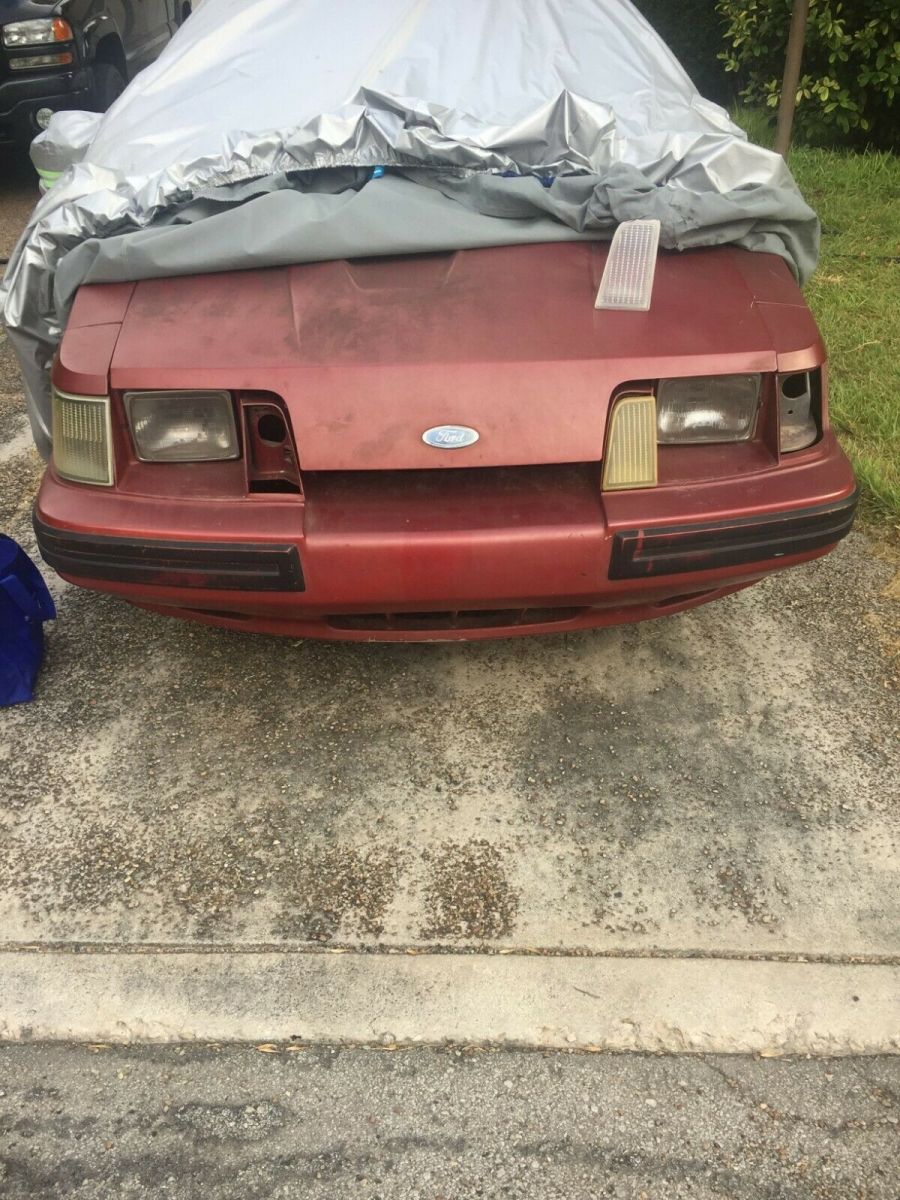 1984 Burgundy Ford Mustang Hatchback