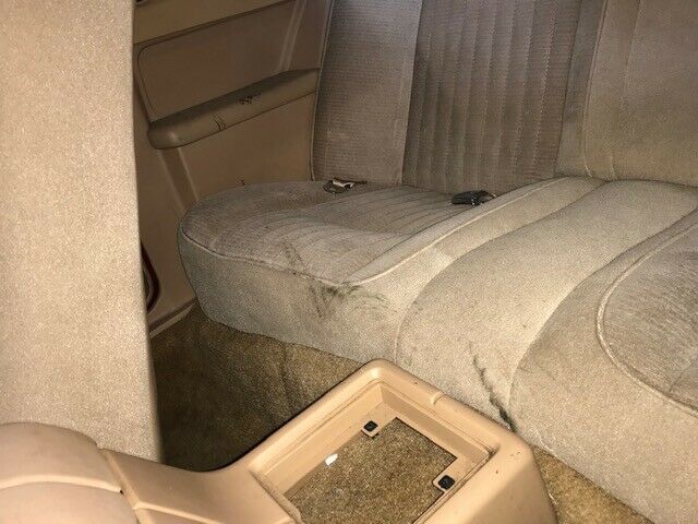 1984 Red Ford Thunderbird Sedan