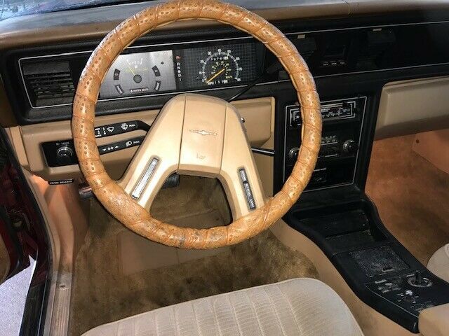 1984 Red Ford Thunderbird Sedan