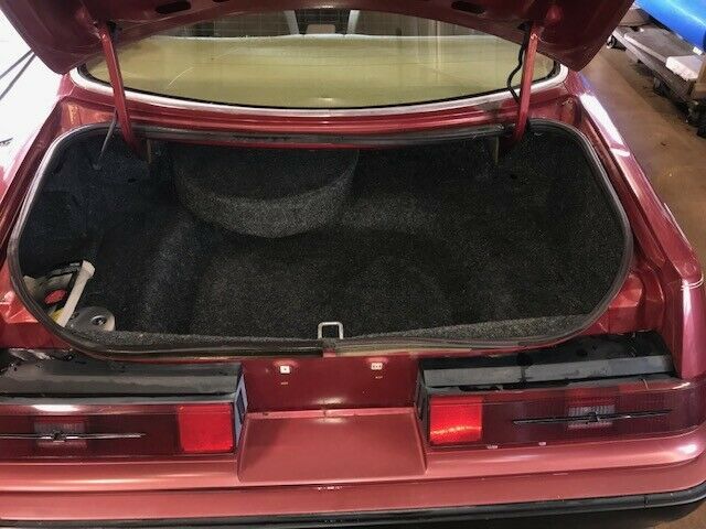 1984 Red Ford Thunderbird Sedan