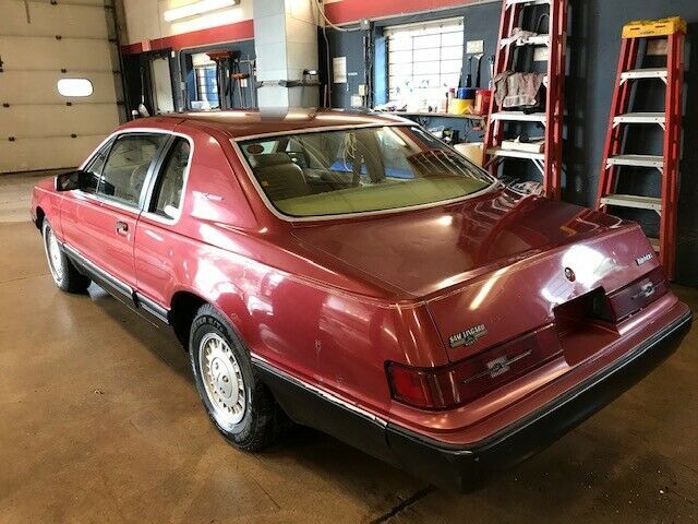 1984 Red Ford Thunderbird Sedan