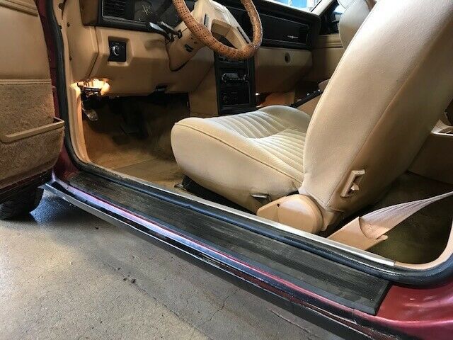 1984 Red Ford Thunderbird Sedan