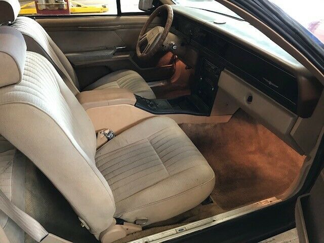 1984 Red Ford Thunderbird Sedan