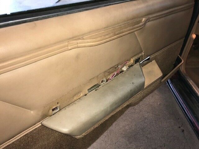 1984 Red Ford Thunderbird Sedan