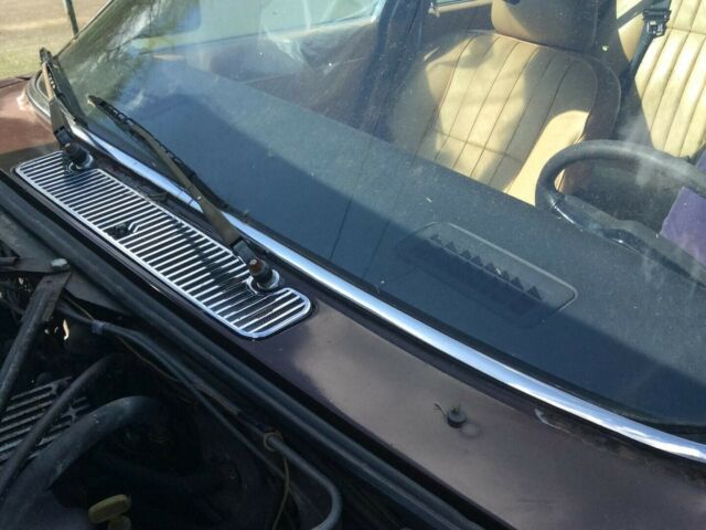 1984 marroon Jaguar XJ6