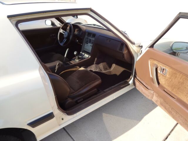 1984 beige Mazda RX-7 Coupe