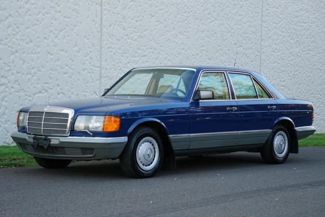 1984 Blue Mercedes-Benz 200-Series Sedan