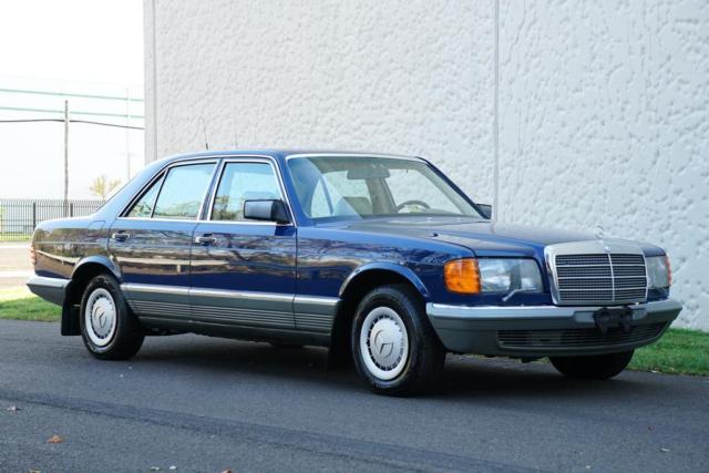 1984 Blue Mercedes-Benz 200-Series Sedan