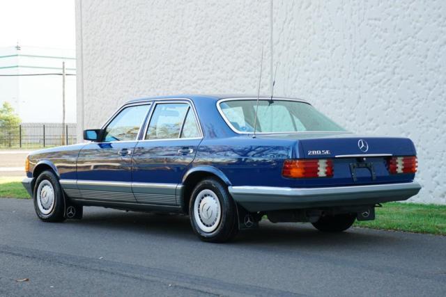 1984 Blue Mercedes-Benz 200-Series Sedan