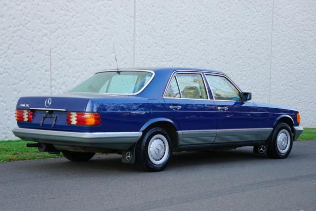 1984 Blue Mercedes-Benz 200-Series Sedan