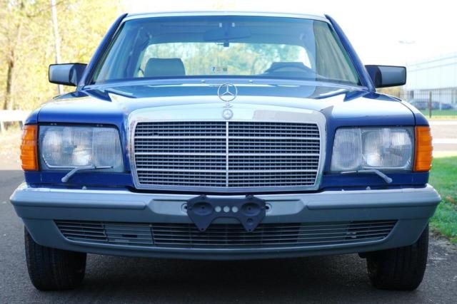 1984 Blue Mercedes-Benz 200-Series Sedan