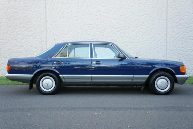 1984 Blue Mercedes-Benz 200-Series Sedan