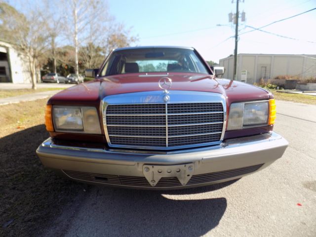 1984 Orient red Mercedes-Benz 300-Series sedan