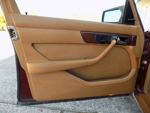 1984 Orient red Mercedes-Benz 300-Series sedan