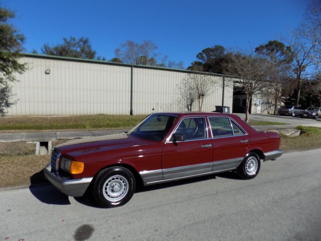 1984 Orient red Mercedes-Benz 300-Series sedan