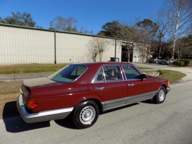 1984 Orient red Mercedes-Benz 300-Series sedan