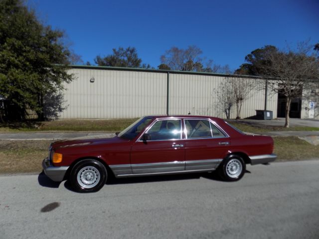 1984 Orient red Mercedes-Benz 300-Series sedan