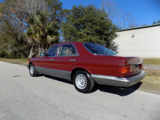 1984 Orient red Mercedes-Benz 300-Series sedan