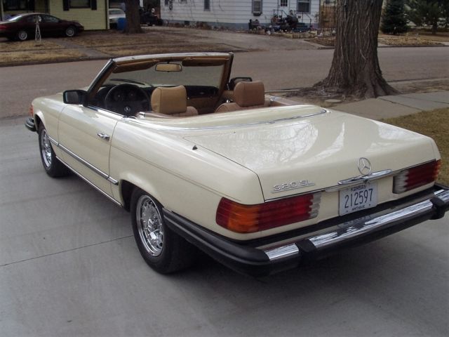 1984 yellow Mercedes-Benz SL-Class Convertible