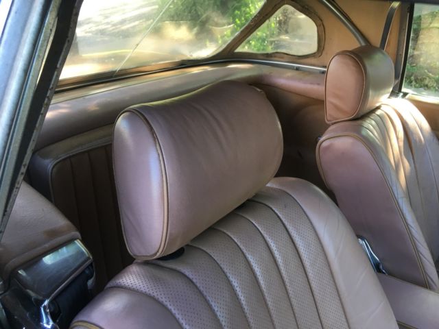 1984 tan Mercedes-Benz SL-Class Convertible