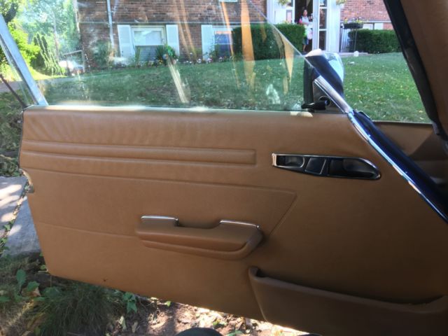 1984 tan Mercedes-Benz SL-Class Convertible