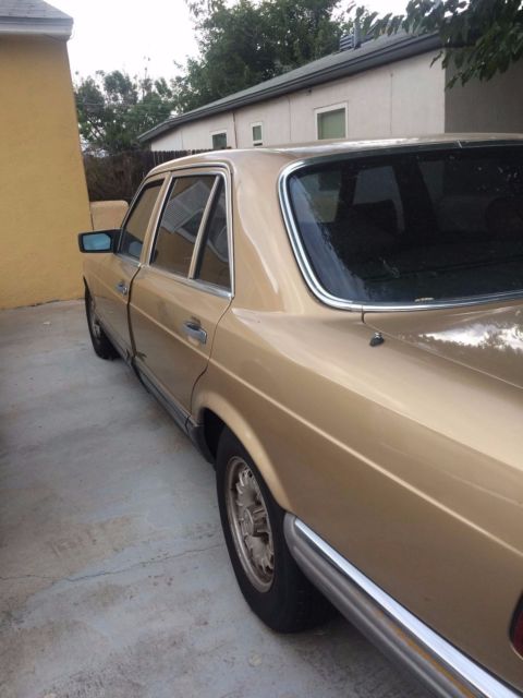 1984 tan Mercedes-Benz SL-Class Convertible