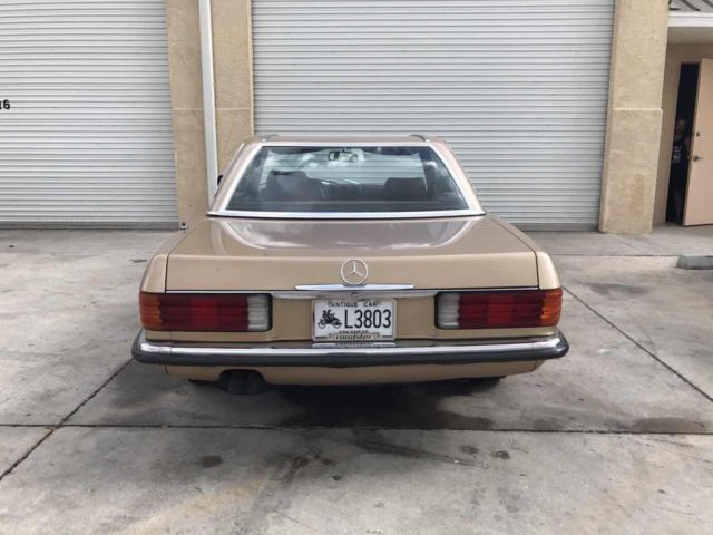 1984 Gold Mercedes-Benz SL-Class Convertible
