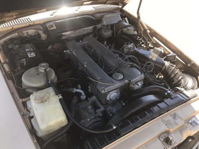 1984 Gold Mercedes-Benz SL-Class Convertible