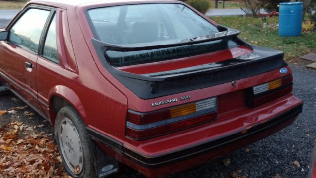 1984 Maroon Ford Mustang