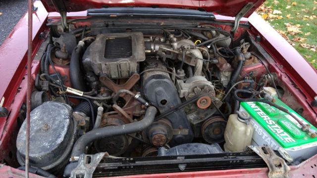 1984 Maroon Ford Mustang