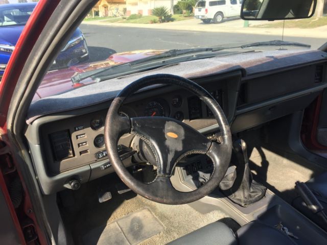 1984 Red Ford Mustang Hatchback