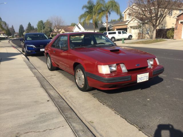 1984 Red Ford Mustang Hatchback